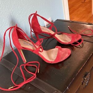 Steve Madden red suede lace up high heel shoes.